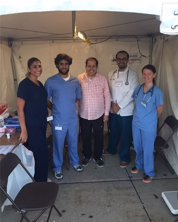 Medical team smiling in tent